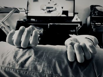 Close-up of hand holding paper