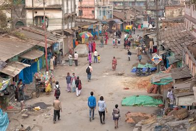 High angle view of people on street in city