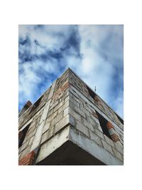 Low angle view of old building against sky