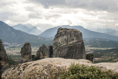 Panoramic view of rocks and mountains against sky