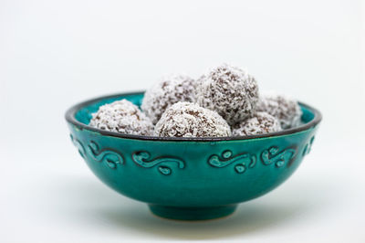 Close-up of food in bowl against white background
