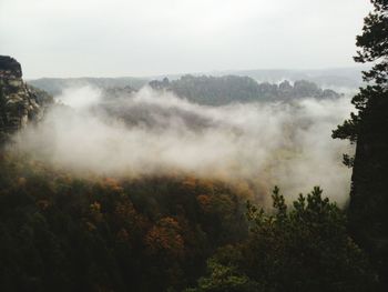 Scenic view of fog against sky