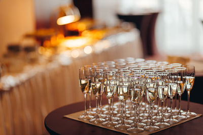 Close-up of illuminated candles on table