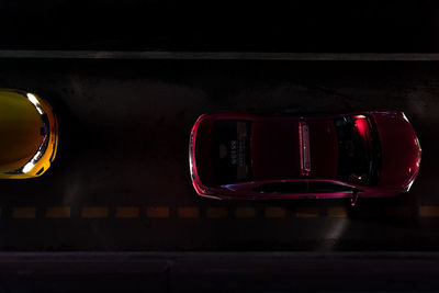 Close-up of illuminated red car