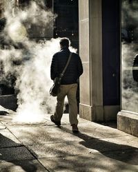 Woman standing in city