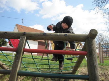 Full length of man in park against sky