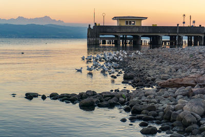 Scenic view of sea against sky at sunset