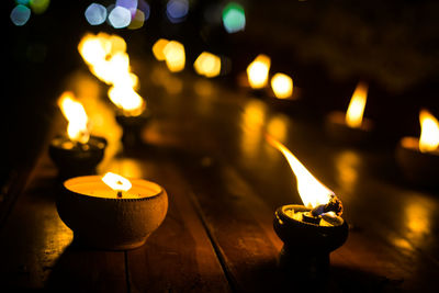 Lit diyas at night