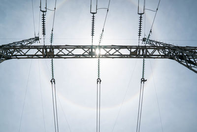 Low angle view of cables against clear sky