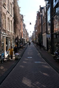 Street amidst buildings in city