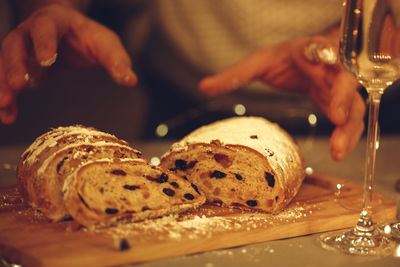 Midsection of person preparing food on table