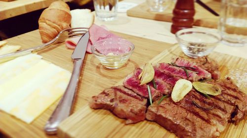 Close-up of food served on table