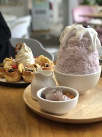 Close-up of ice cream served on table