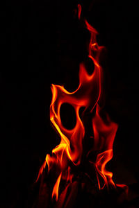 Close-up of bonfire against black background