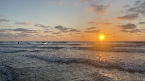 Scenic view of sea against sky during sunset