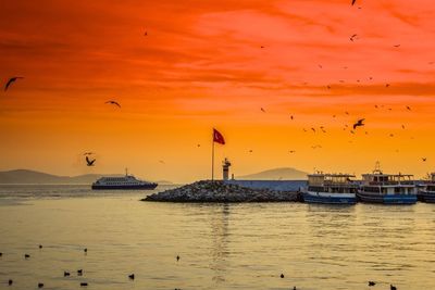 Scenic view of sea at sunset