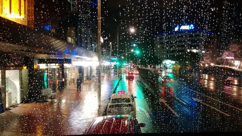 Illuminated street lights at night