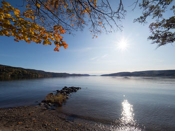 Scenic view of lake against sky during autumn