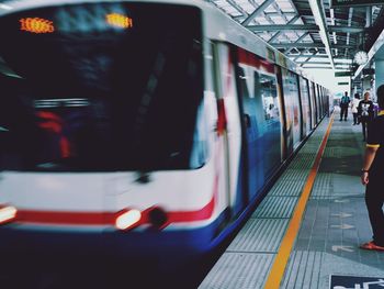 People at railroad station platform