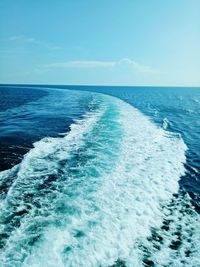 Scenic view of sea against blue sky