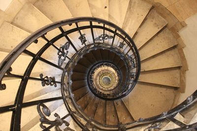 Directly below shot of spiral staircase in building