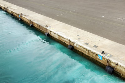 High angle view of harbor by sea