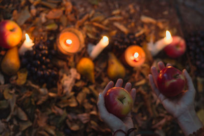 Close up apples and candles concept photo