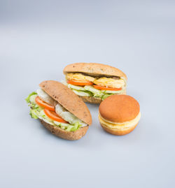 Close-up of bread against white background