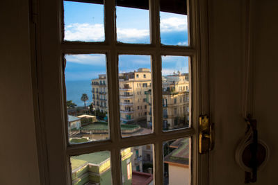 Buildings seen through window