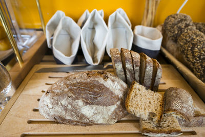 Close-up of breads on cutting board