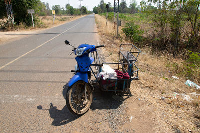 Bicycle parked on road