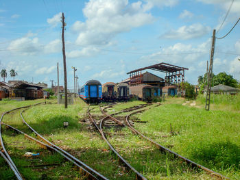 Train on railroad track against sky