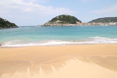 Scenic view of beach against sky