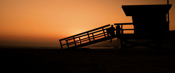 Scenic view of calm sea at sunset