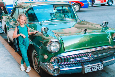 Portrait of boy sitting in car