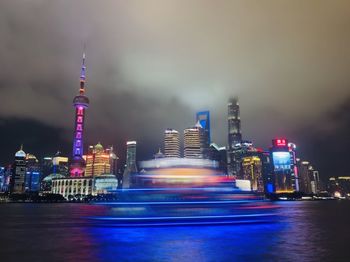 Illuminated buildings in city at night