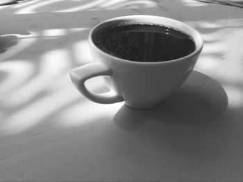 High angle view of coffee cup on table