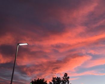 Low angle view of cloudy sky at sunset