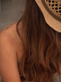 Close-up portrait of woman in hat