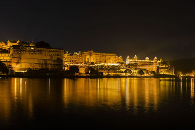 Illuminated city lit up at night