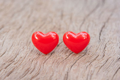 Close-up of red heart shape on table