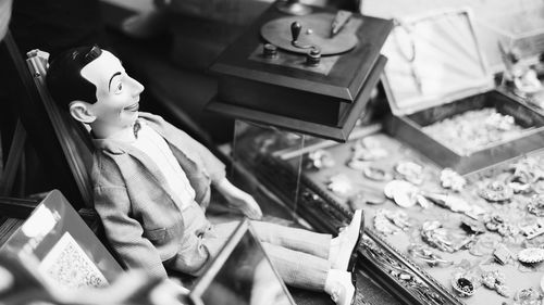 High angle view of figurine on table at home