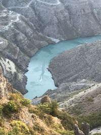 High angle view of lake amidst rocks