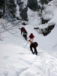 High angle view of people on snowcapped mountain