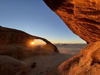 Scenic view of desert against clear sky