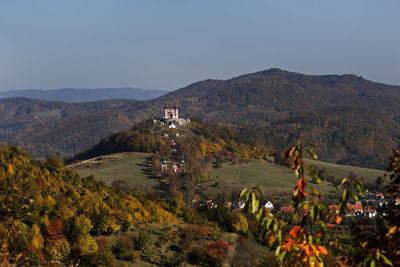 Scenic view of landscape and mountains against sky