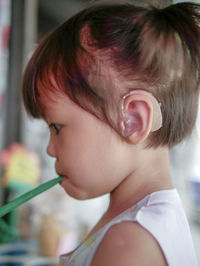 Close-up portrait of cute girl