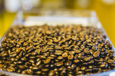 Close-up of coffee beans in container