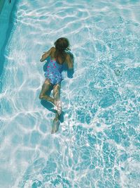 High angle view of girl in swimming pool