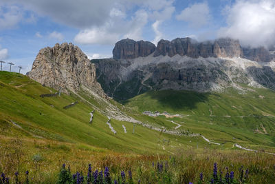 Panoramic view of dolomite landscape against dramatic sky